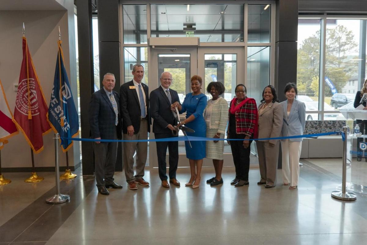 Group photo of the ribbon cutting