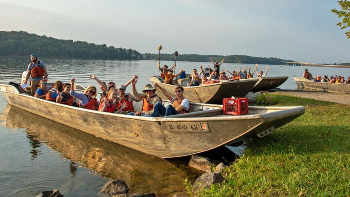 Volunteers come ashore during 'Keep the Tennessee River Beautiful Month.'