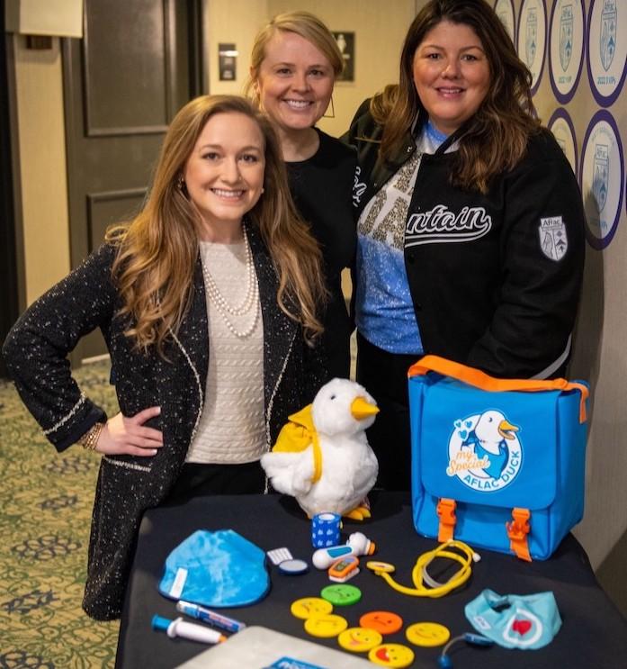 Alayne Gamache, Aflac; Sara Orton, development director, Aflac Cancer and Blood Disorders Center; and Jaime Gaudet, Aflac Market Director, deliver My Special Aflac Ducks to St. Luke’s Children’s Hospital in Boise Idaho.