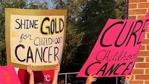 Spectators at the Firefighters 5K CURE Childhood Cancer.