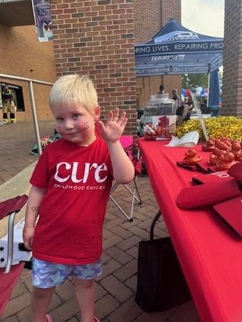 Charlotte shown at the Firefighters 5K.