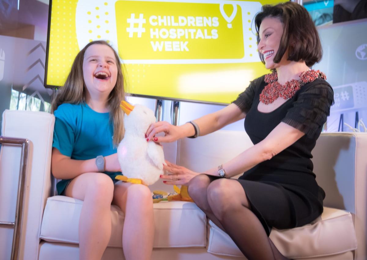 Chloe Davison, a 10-year-old from Grants Pass, Ore. who was diagnosed with Leukemia at age 5, smiles joyfully as Catherine Hernandez-Blades, SVP and Chief Brand and Communications Officer at Aflac, introduces her to My Special Aflac DuckTM – a robotic caring companion designed to help children cope with cancer, while in Orlando, Fla. celebrating Children’s Miracle Network Hospitals’ #ChildrensHospitalsWeek. To learn more about how Aflac and CMN Hospitals are helping children with cancer, visit aflac.com/cmn.