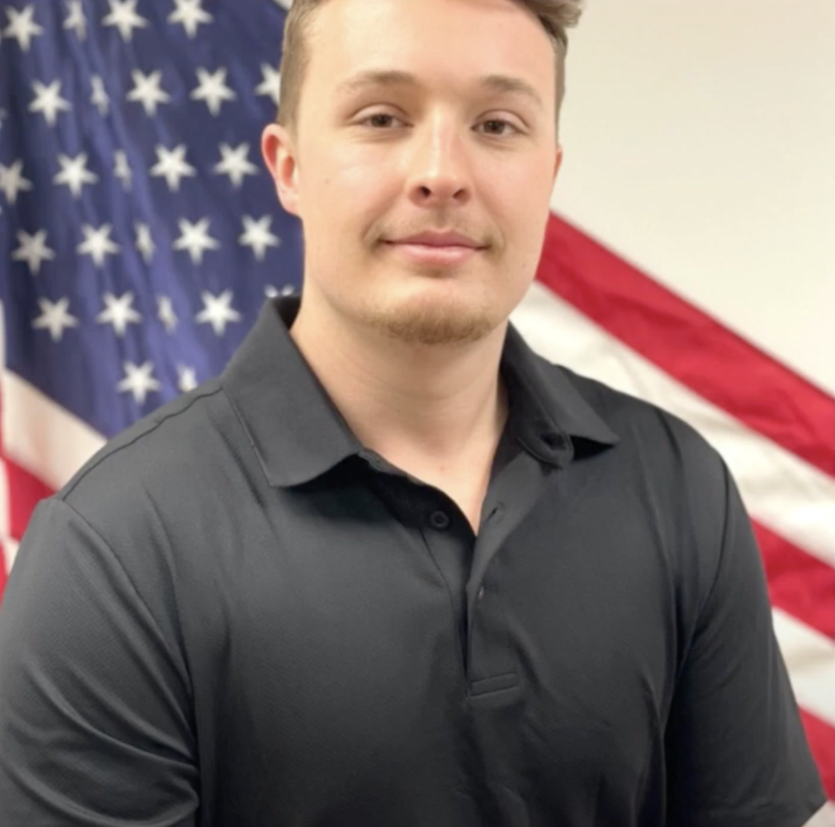 Alex Hutcheson – ekō Solutions’ Technical Team Leader Alex Hutcheson stood in front of the American flag