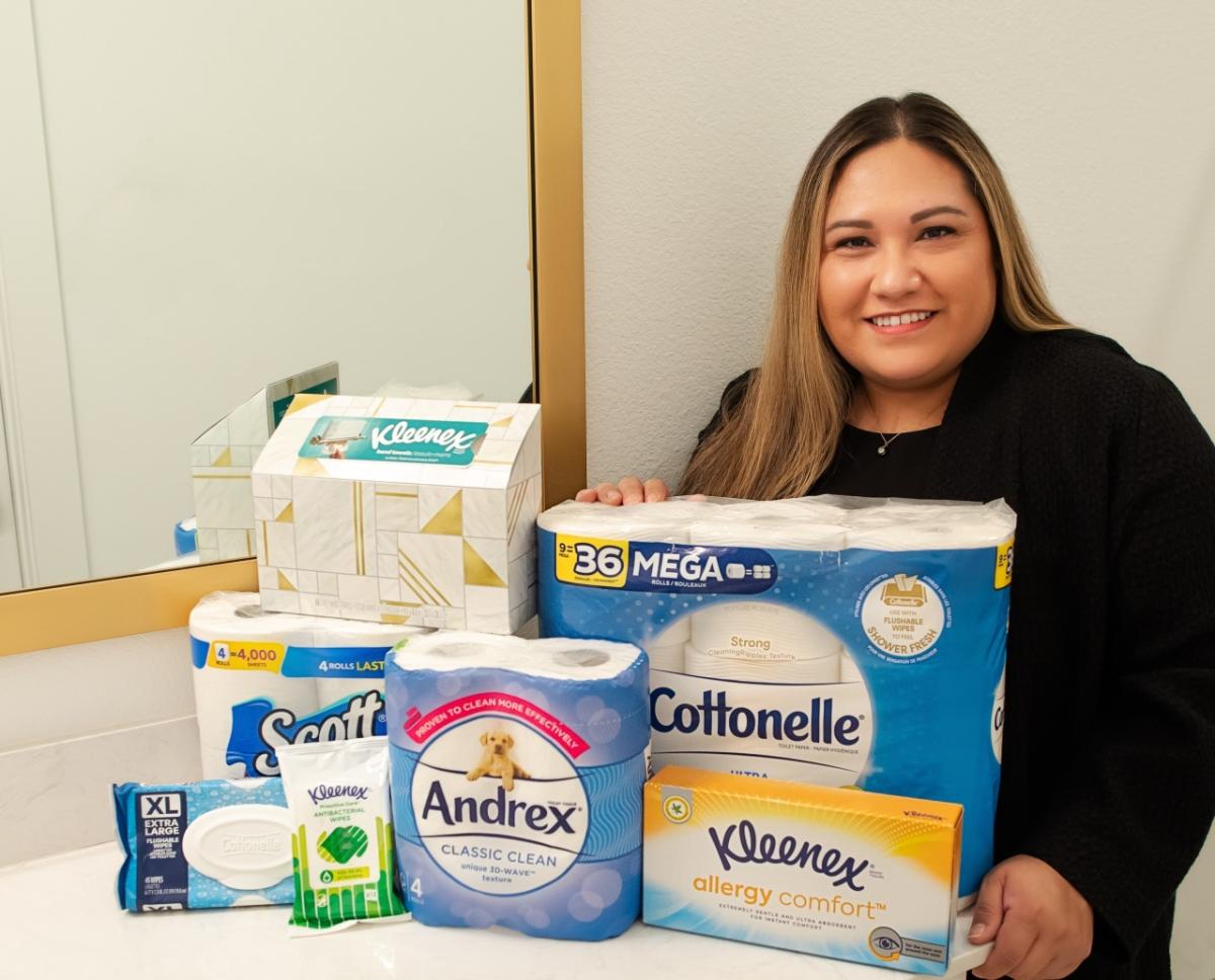 Alma Alejandro with Kimberly-Clark products
