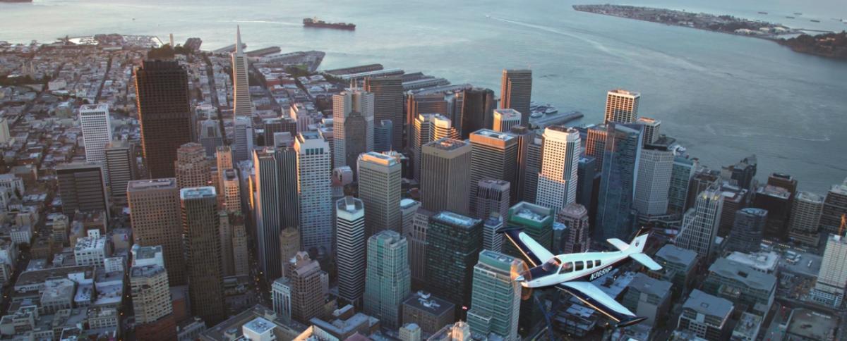 Financial Advisor Fritz Glasser of Wells Fargo Advisors, and a volunteer for Angel Flight West, flies over San Francisco. Photo credit: Owen Leipelt
