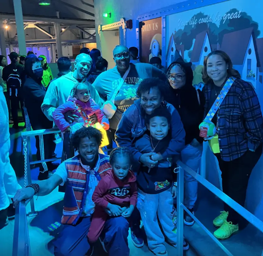 Angora and her family at an amusement park.