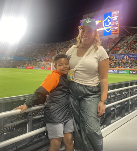 Angora and her son at a soccer game.