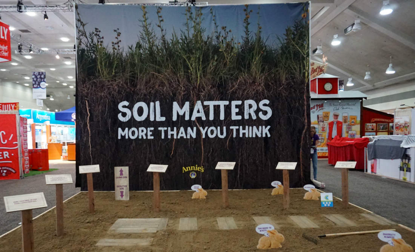 Annie’s 2017 Expo East booth blew us away through its focus on soil health!