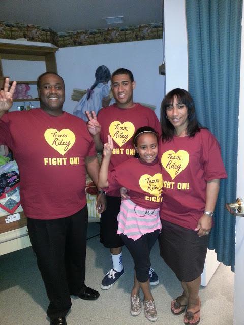 (L-R) Antawong and his son, Antawong Jr.; daughter, Auriana; and spouse, Shamon, supporting a hospitalized child through “Team Riley.”