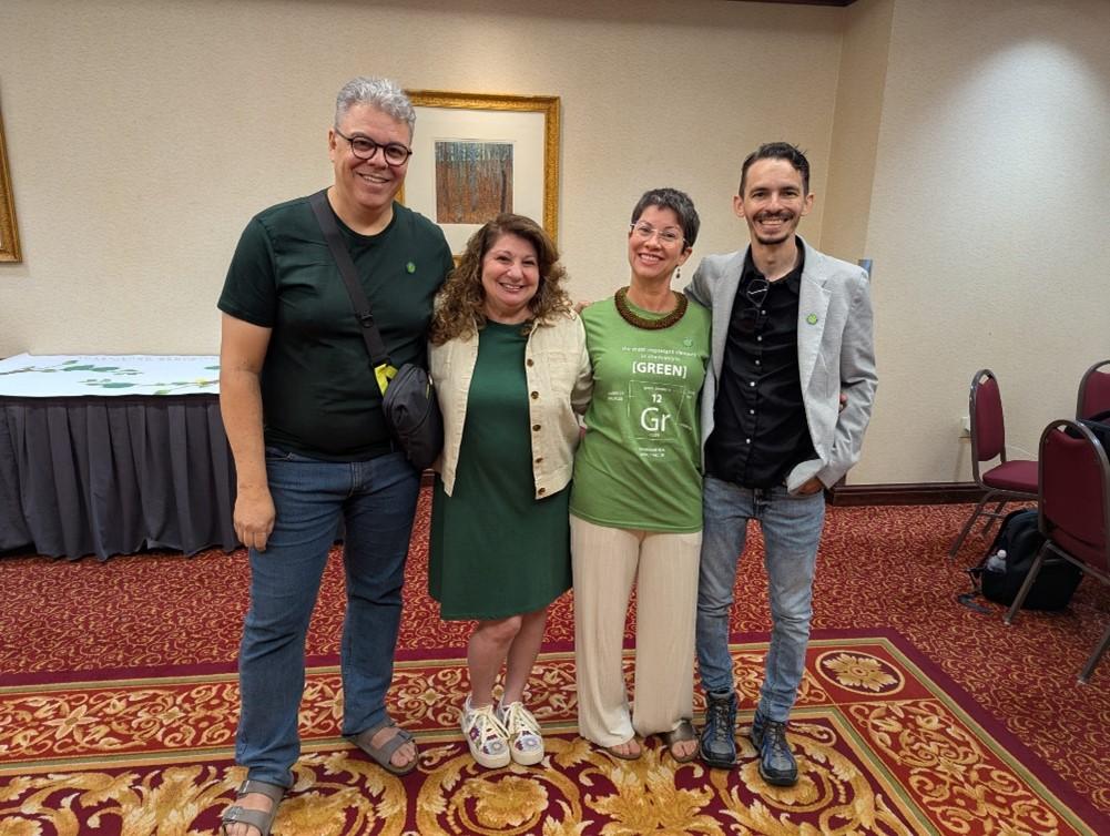 Four chemistry professionals grouped together