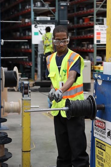 Charles Davis, one of the first graduates of Aspire’s new Employment Training Program, at work at Wesco.