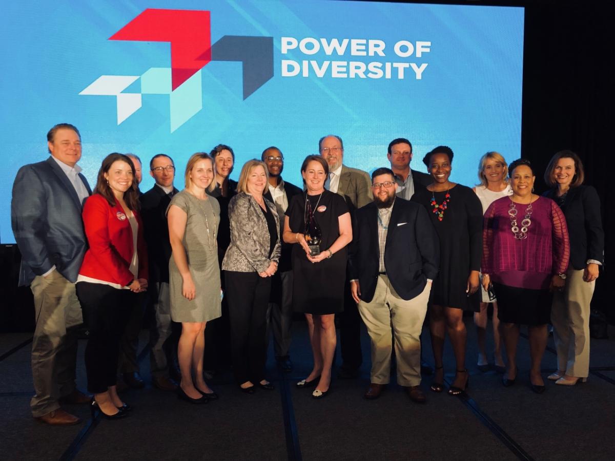 Stephanie Hasenbos-Case, Black & Veatch’s Chief Human Resources Officer (center), and other professionals with the global engineering and construction company accept the 2019 "Champion of Diversity Award" from the Greater Kansas City Chamber of Commerce. The award is presented to a regional business that the chamber says “has made a durable commitment to embracing diversity in their workplace, diversity supplier partnerships, and the community."