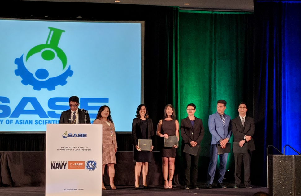 Pictured (from left to right): SASE presenter, Suki Han, principal at Booz Allen and the Booz Allen awardees, Shruti Shah, Stephanie Ling, Regina Lam, Tamim Akimi and Brian Kawamura.