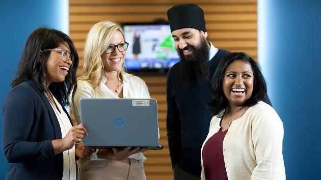 colleagues laughing together 