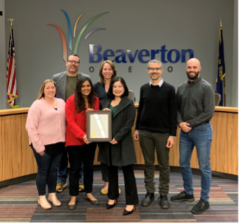 In photo, left to right, Council President Ashley Hartmeier-Prigg, Councilor John Dugger, Councilor Nadia Hasan, Councilor Allison Tivnon, Quiyan He, IP, Ryan Middaugh, IP, Councilor Kevin Teater " "
