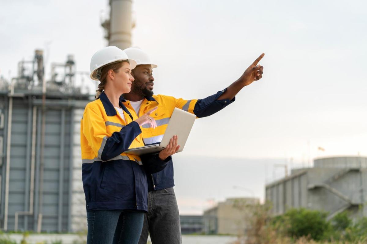 Engineers looking onward at site 