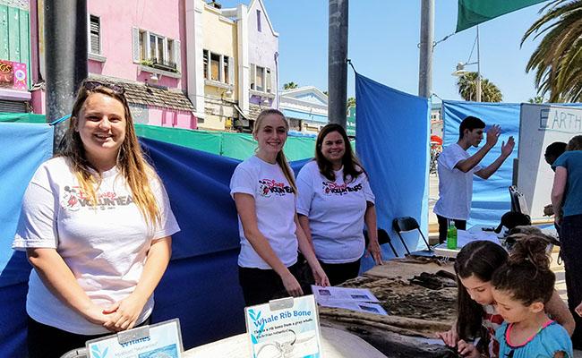 Morgan, Caitlin and Susan Birthright volunteer regularly with Heal the Bay's Santa Monica Pier Aquarium events on Saturdays, educating the public about marine life.