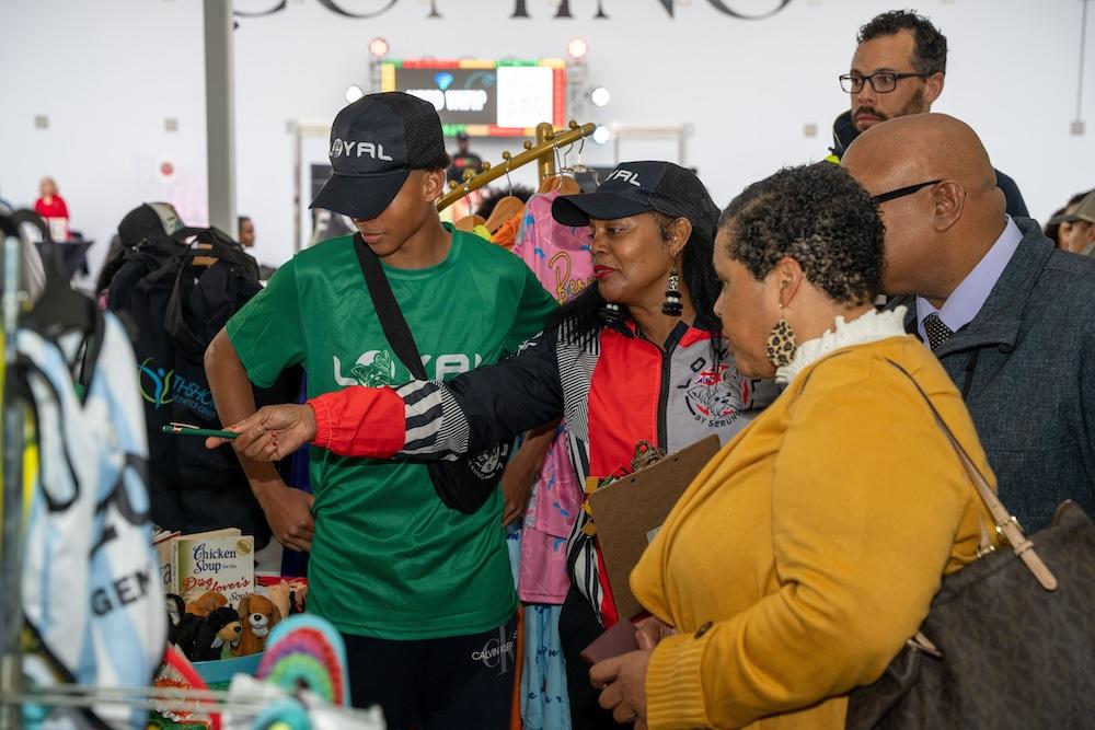 A group of four shoppers at Bacardi's Black-Owned Vendor Market in Bermuda,