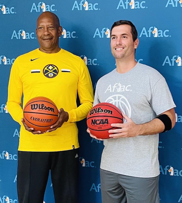 Alex English (left) and Bob Ruff (right) get ready for tip off. 