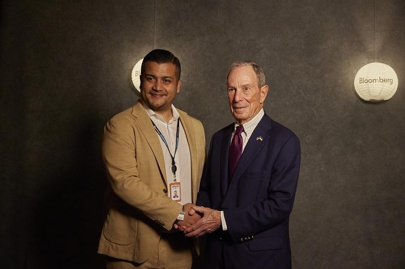 Two people shaking hands for a photo