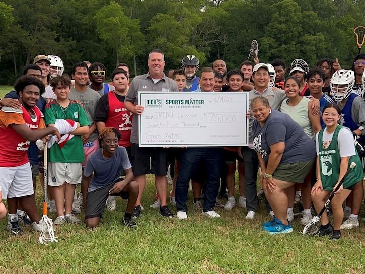 Bridge Lacrosse team receiving a Sports Matter grant.