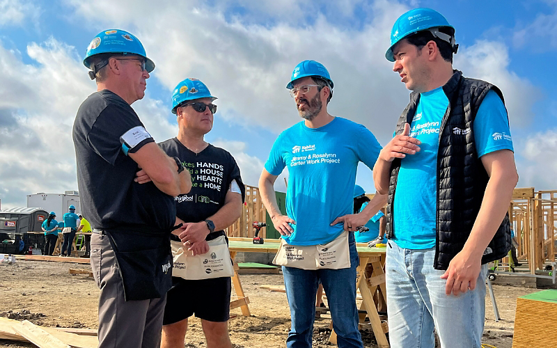 Group talking at the Jimmy & Rosalynn Carter Work Project in Austin, Texas