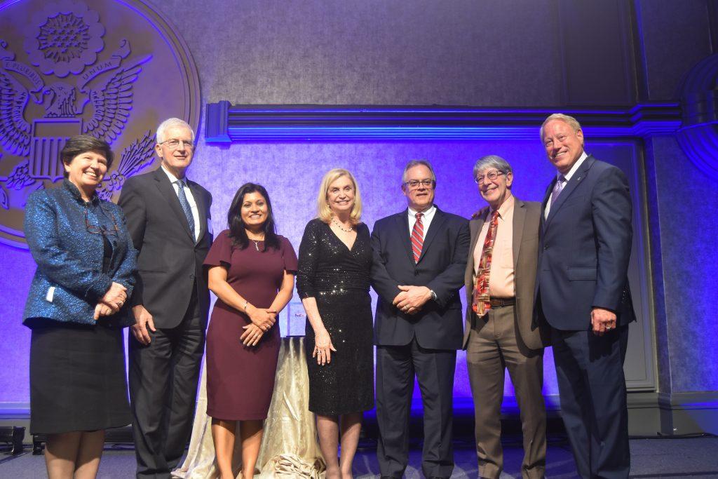 Mark Allen (third from right), Executive VP, General Counsel and Secretary of FedEx Corporation