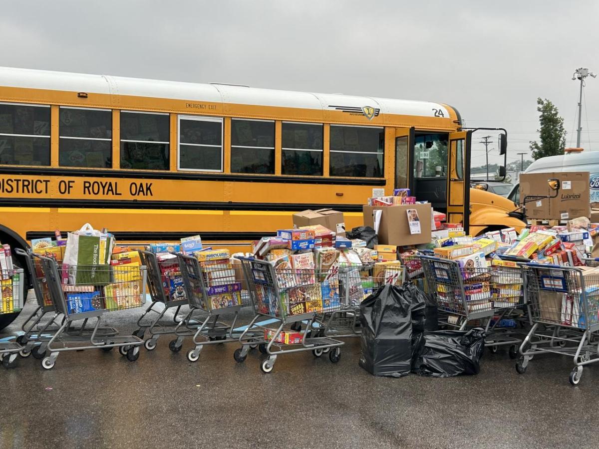 Boxes of donated cereal outside of the school bus