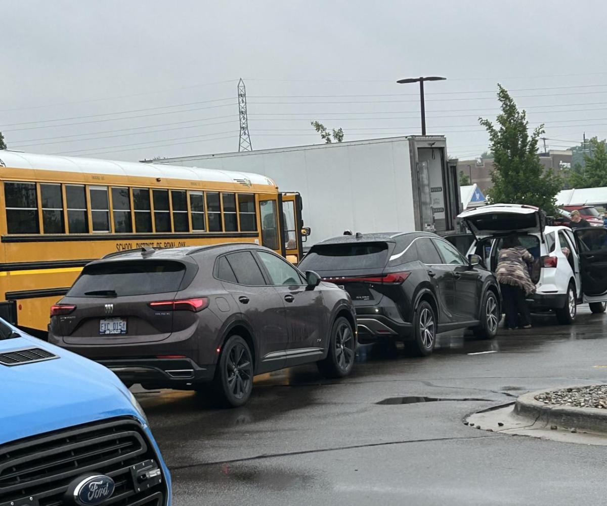 Cars lining up to drop of cereal donations 