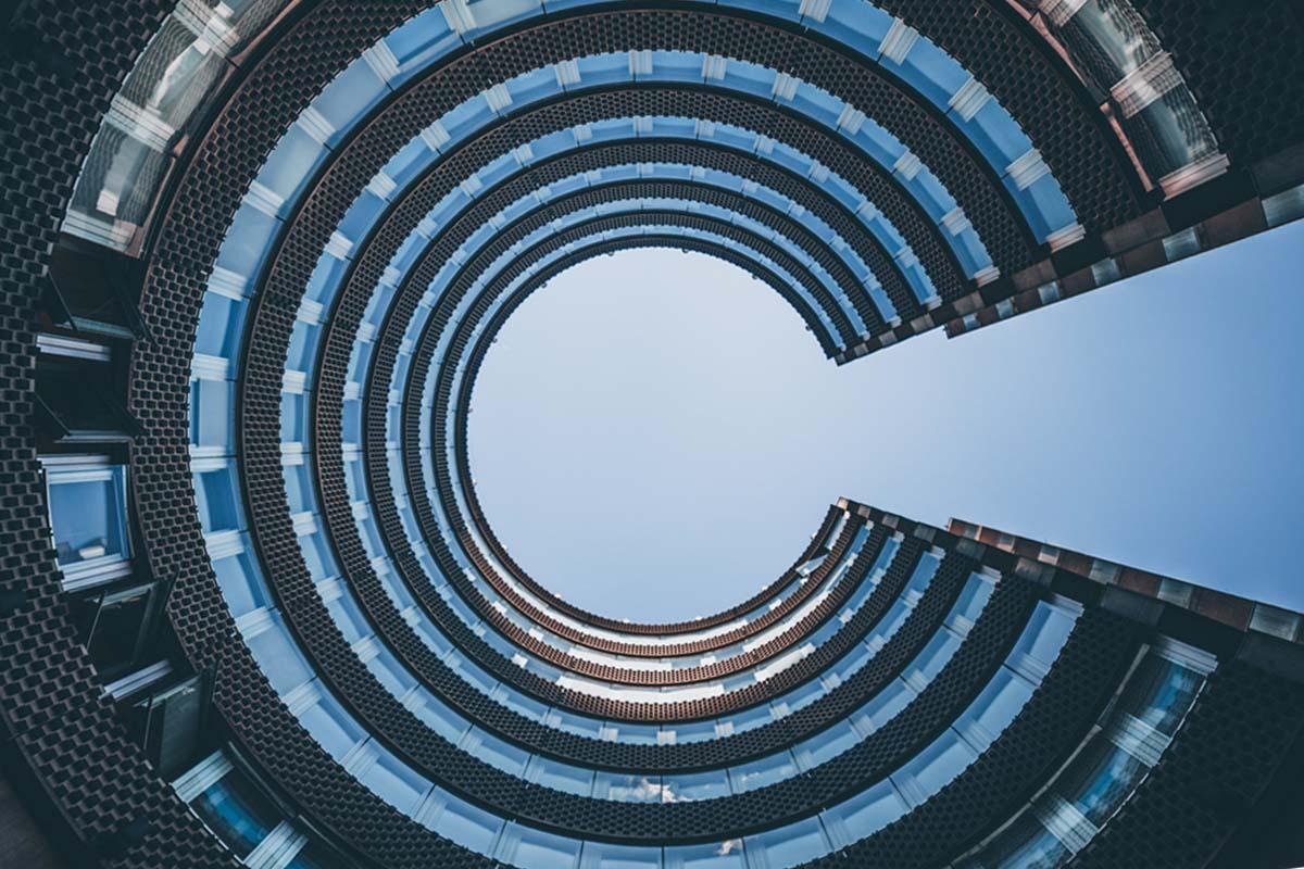 artistic circular building with a view of the sky