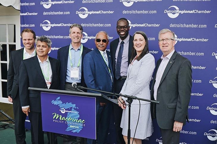 From left: Trevor Pawl, Group VP, Pure Michigan Business Connect; Robert Garcia, Sr., President and CEO of Commercial Construction Inc.; Gerard Anderson, CEO, DTE Energy; Louis E. James, President and CEO of SEEL LLC; Lt. Gov. Garlin Gilchrist; Patti Poppe, President and CEO, Consumers Energy; MEDC CEO Jeff Mason