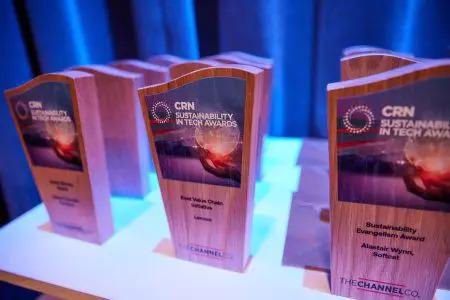 A table full of matching awards. "CRN" at the tops.