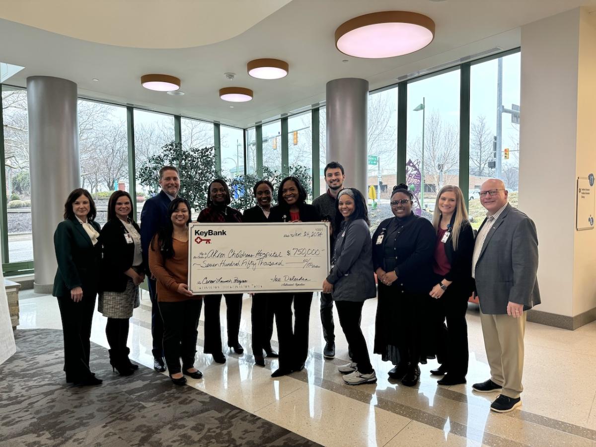 Representatives from Akron Children's Foundation shown receiving a $750,000 grant from KeyBank.