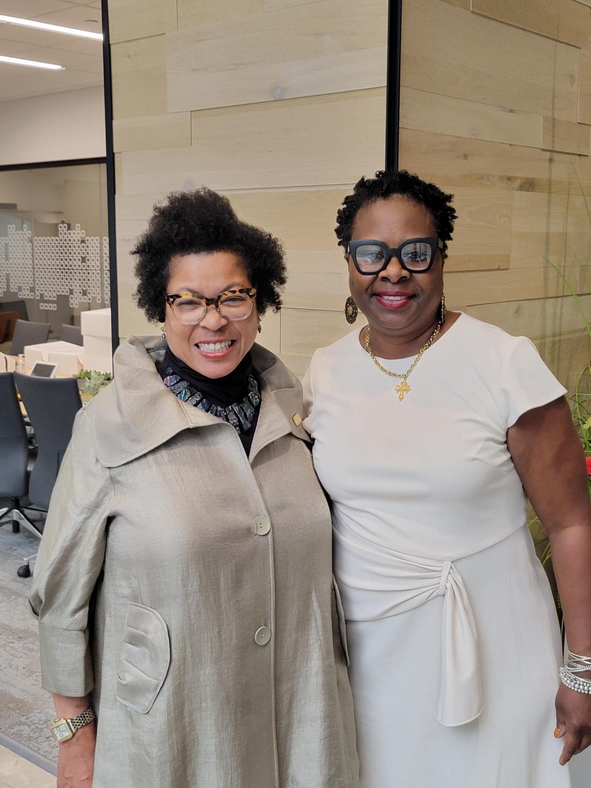 Stephanie Smith and Carla Cobb in an office setting