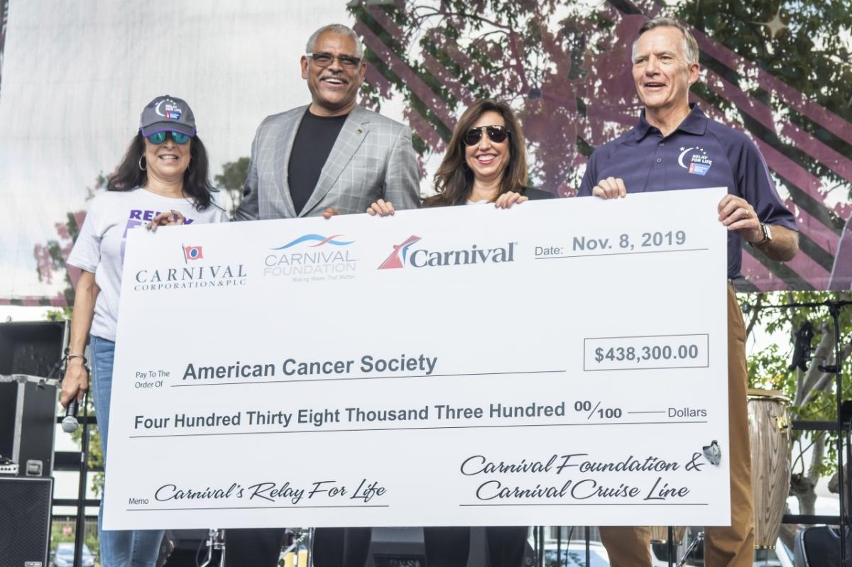 At Carnival Foundation’s Relay For Life for the American Cancer Society, Linda Coll (left), executive director of Carnival Foundation; Arnold Donald, president and CEO of Carnival Corp.; and Christine Duffy, president of Carnival Cruise Line; presented a check for $438,300 raised to date to Gary Reedy (right), CEO of American Cancer Society. The six-hour event brought that figure to more than $500,000, making Carnival's total donation over $1 million.