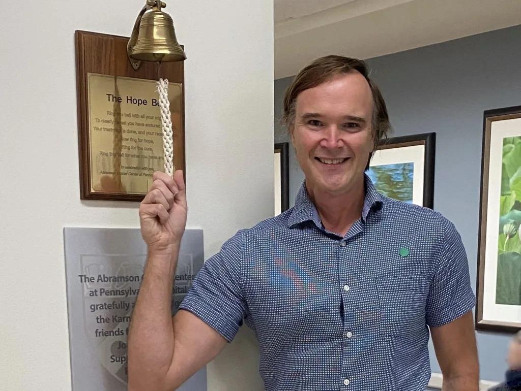 Chet Kitchen ringing a 'hope bell'.