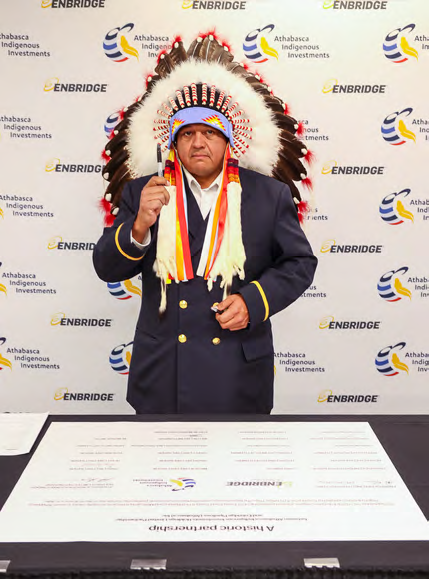 Chief Desjarlais participating in the Athabasca equity partnership signing ceremony. " "