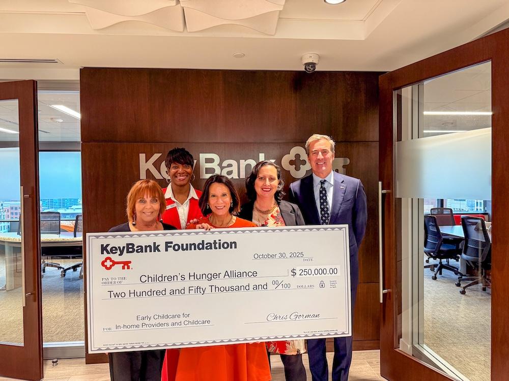 Members of the Children's Hunger Alliance and KeyBank representatives shown with a $250,000 grant check.
