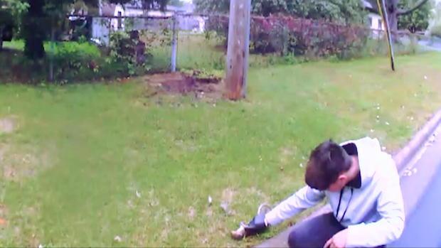 Body cam video shows Chris Felix trying to save a squirrel. Source: CBSNews.com and Brooklyn Park PD