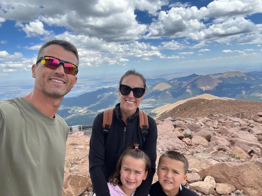 Christine Perkins and her family on a vacation doing a hike.