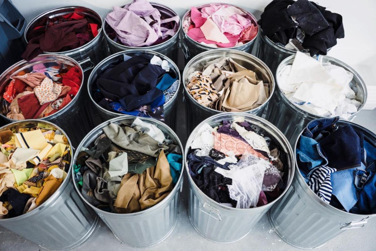 Tin buckets filled with clothing