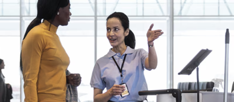 Two people shown having a discussion.