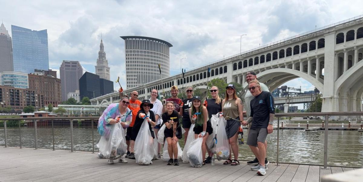 AEG employees helped collect trash at the second annual River Cleanup at Jacob’s Pavilion.