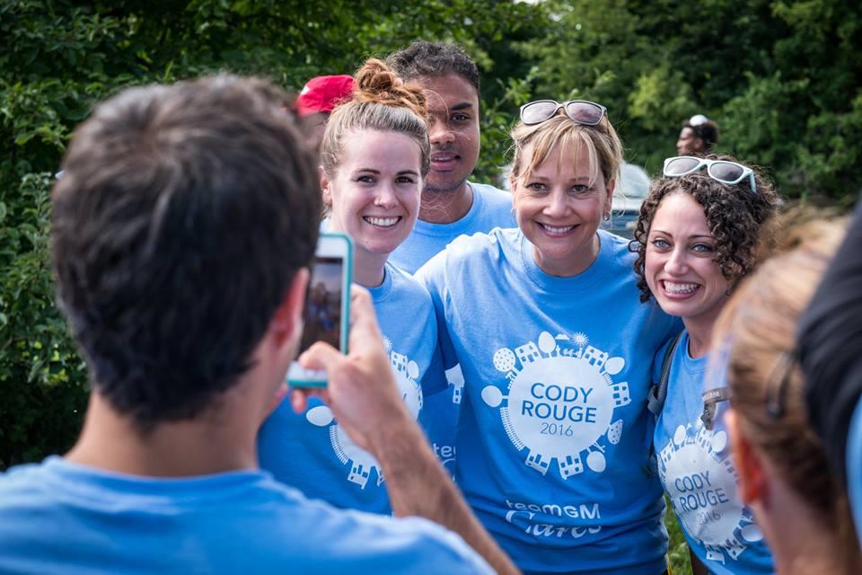 GM Chairman and CEO Mary Barra volunteers with employees in Detroit’s Cody community. (Photo by Steve Fecht for General Motors)