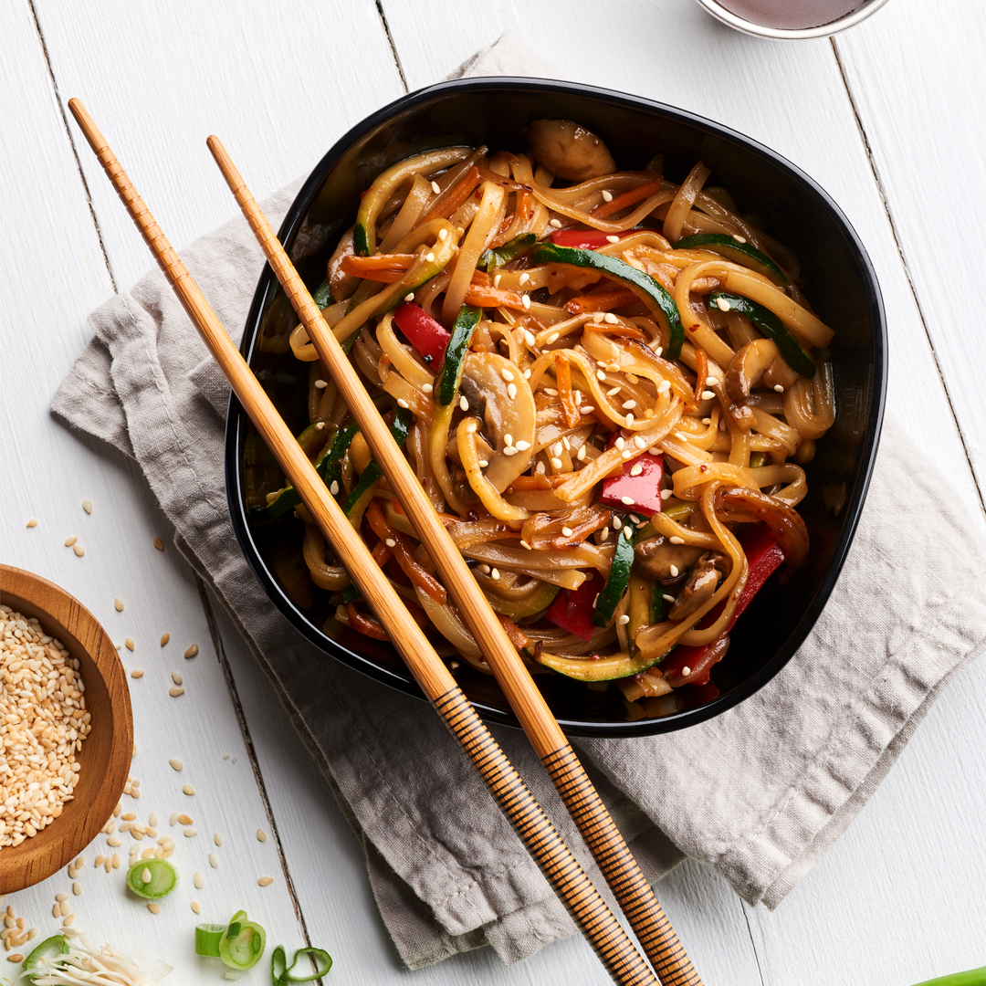 Bowl of noodles and chopsticks