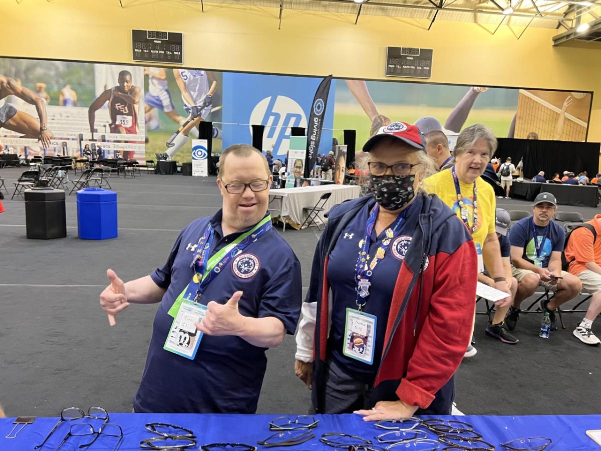 Two Special Olympics participants wearing glasses 