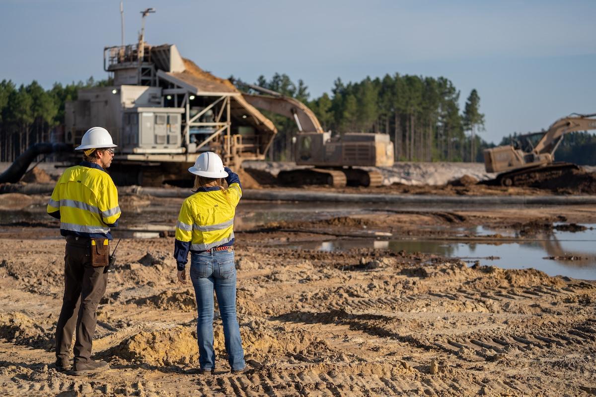 people looking onto a worksite