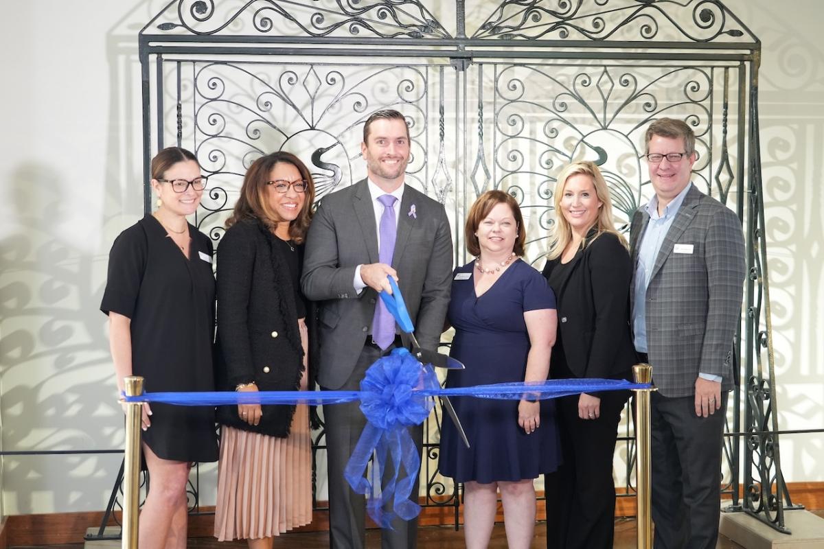 Cutting the ribbon at the South Carolina State Museum. 