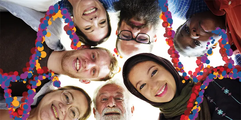 diverse group of people, standing close together and smiling