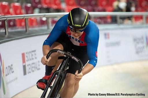 MK pumps through a bank on the velodrome track at the Para-cycling Track World Championships.
